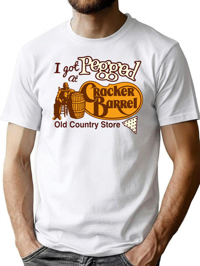 I Got Pegged At Cracker Barrel Old Country Store I Got Pegged At Cracker Premium Heavyweight Cotton T-Shirt - Black